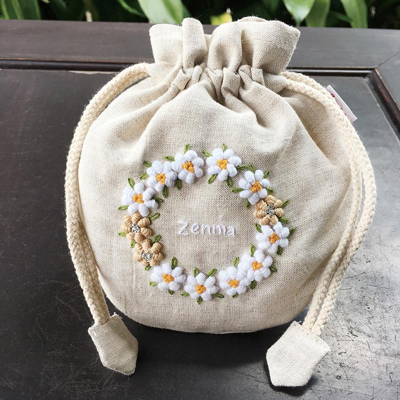 まんまる巾着　マーガレット柄(ボルドー) *handmade* まんまる巾着 マーガレット柄(ボルドー) *handmade*